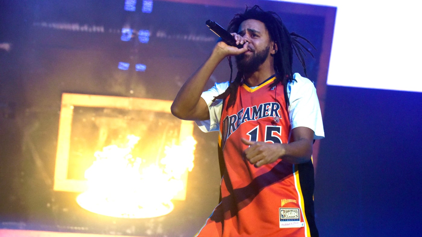 J Cole is seen performing at a show for fans