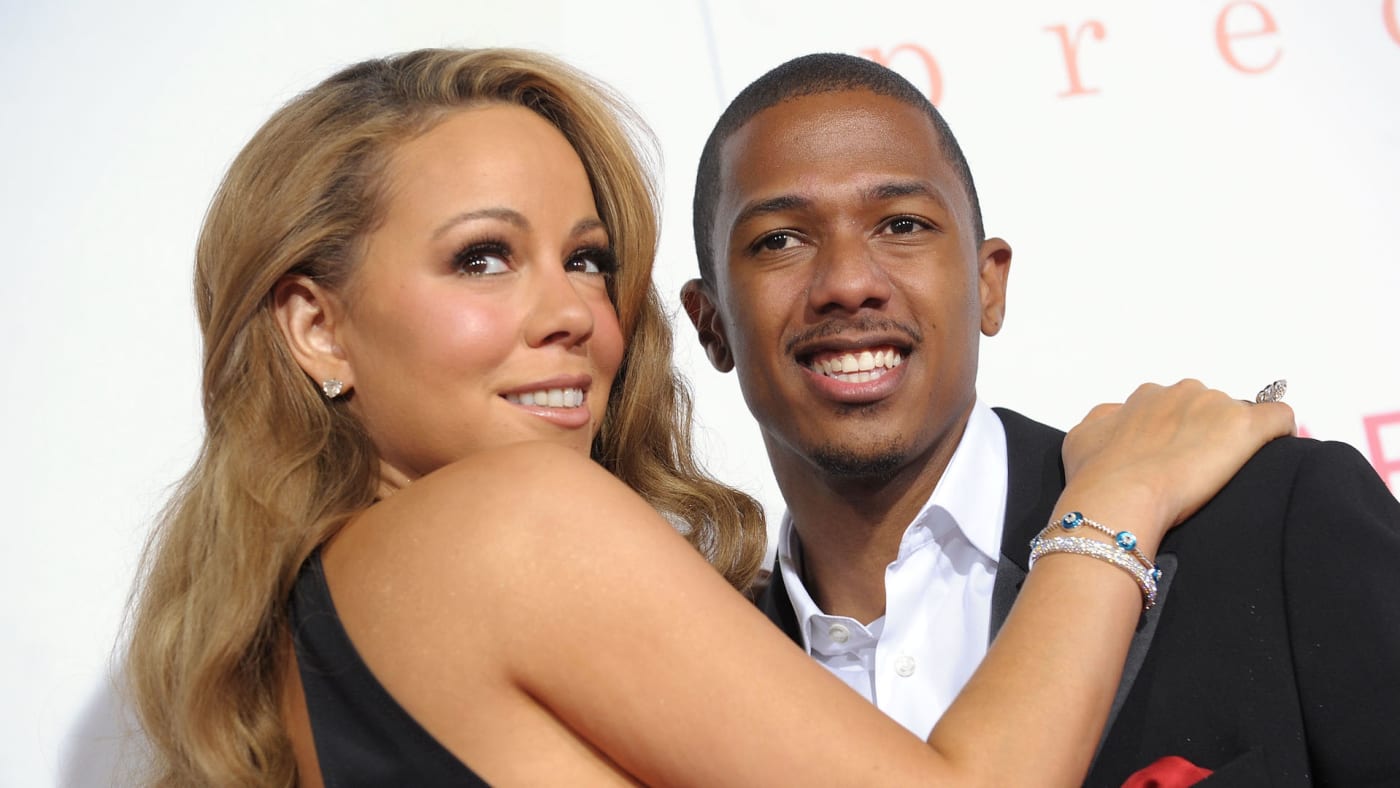 This is an image of Mariah Carey on the right and Nick Cannon on the left