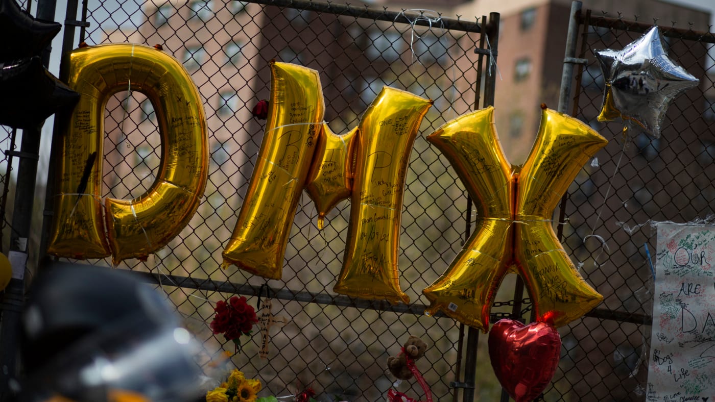 Balloons are placed at a makeshift memorial for DMX outside White Plains Hospital.