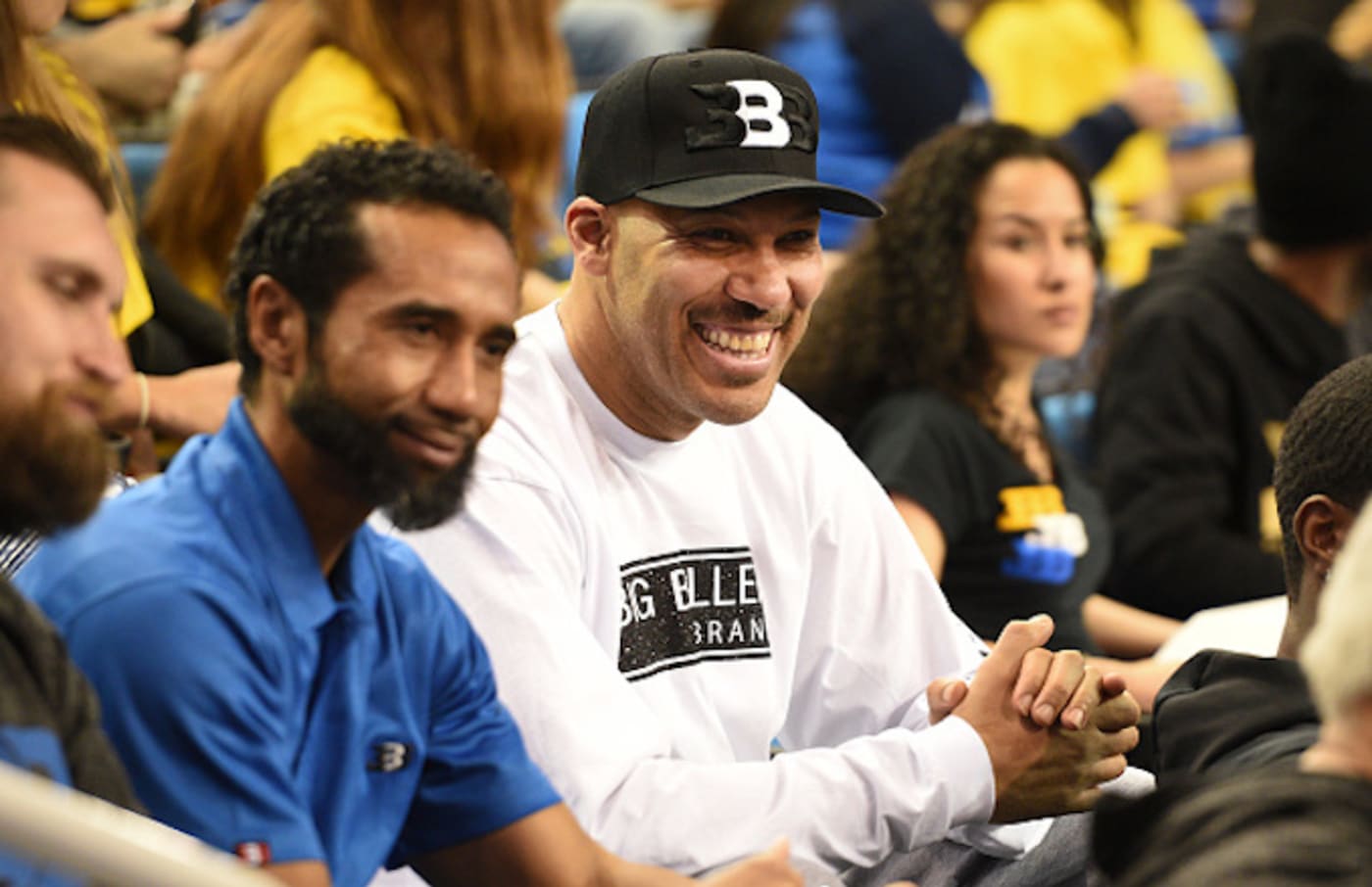 LaVar Ball looks on during a college basketball game