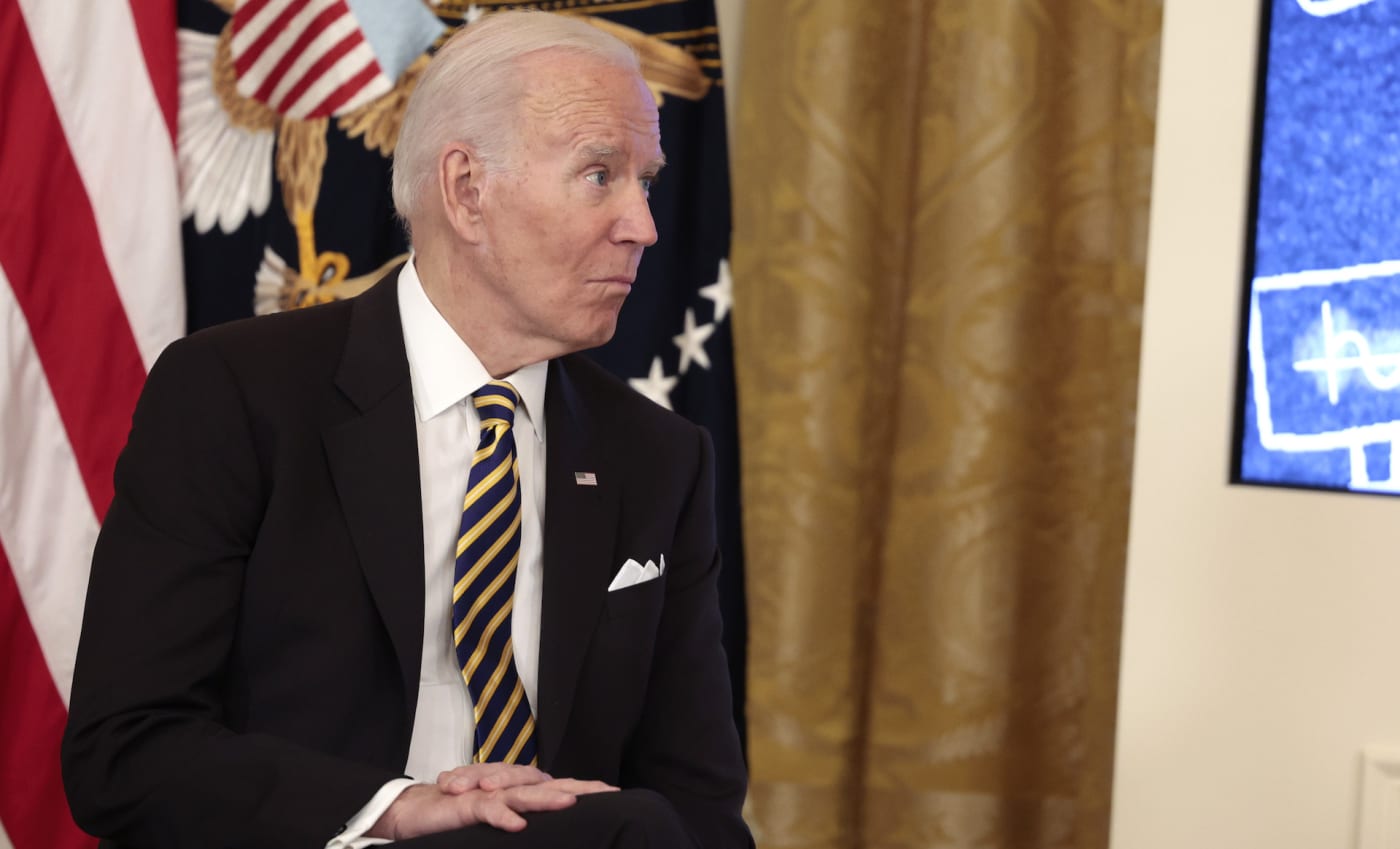 Joe Biden sitting in striped tie