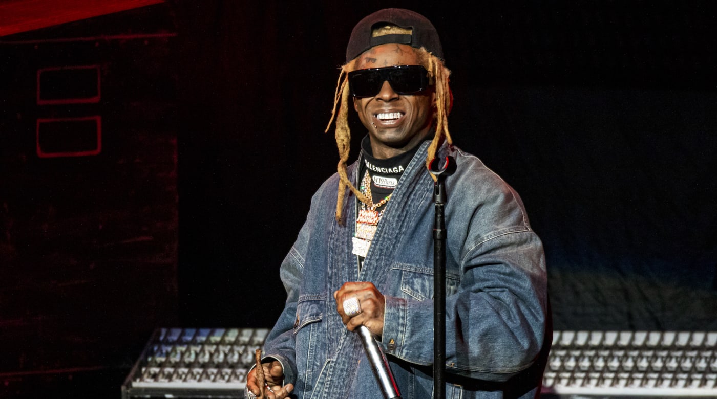Lil Wayne on stage performing.