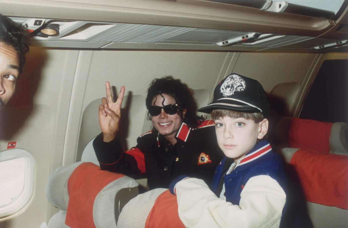 Michael Jackson with 10 year old Jimmy Safechuck on the tour plane