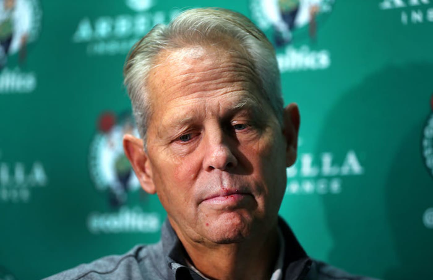 Danny Ainge listens to a reporter's question during an open practice at TD Garden.
