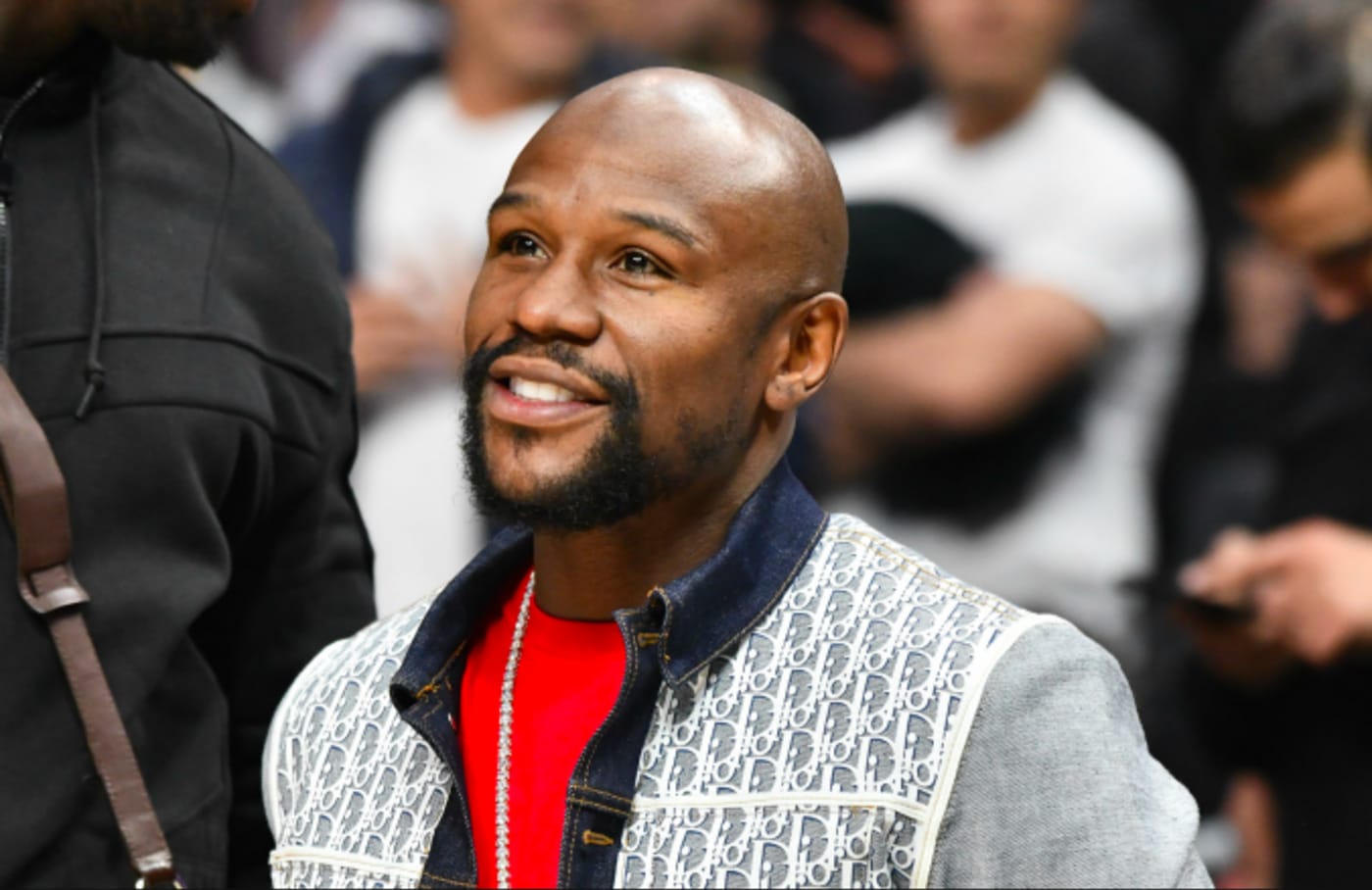 Floyd Mayweather Jr. attends a basketball game
