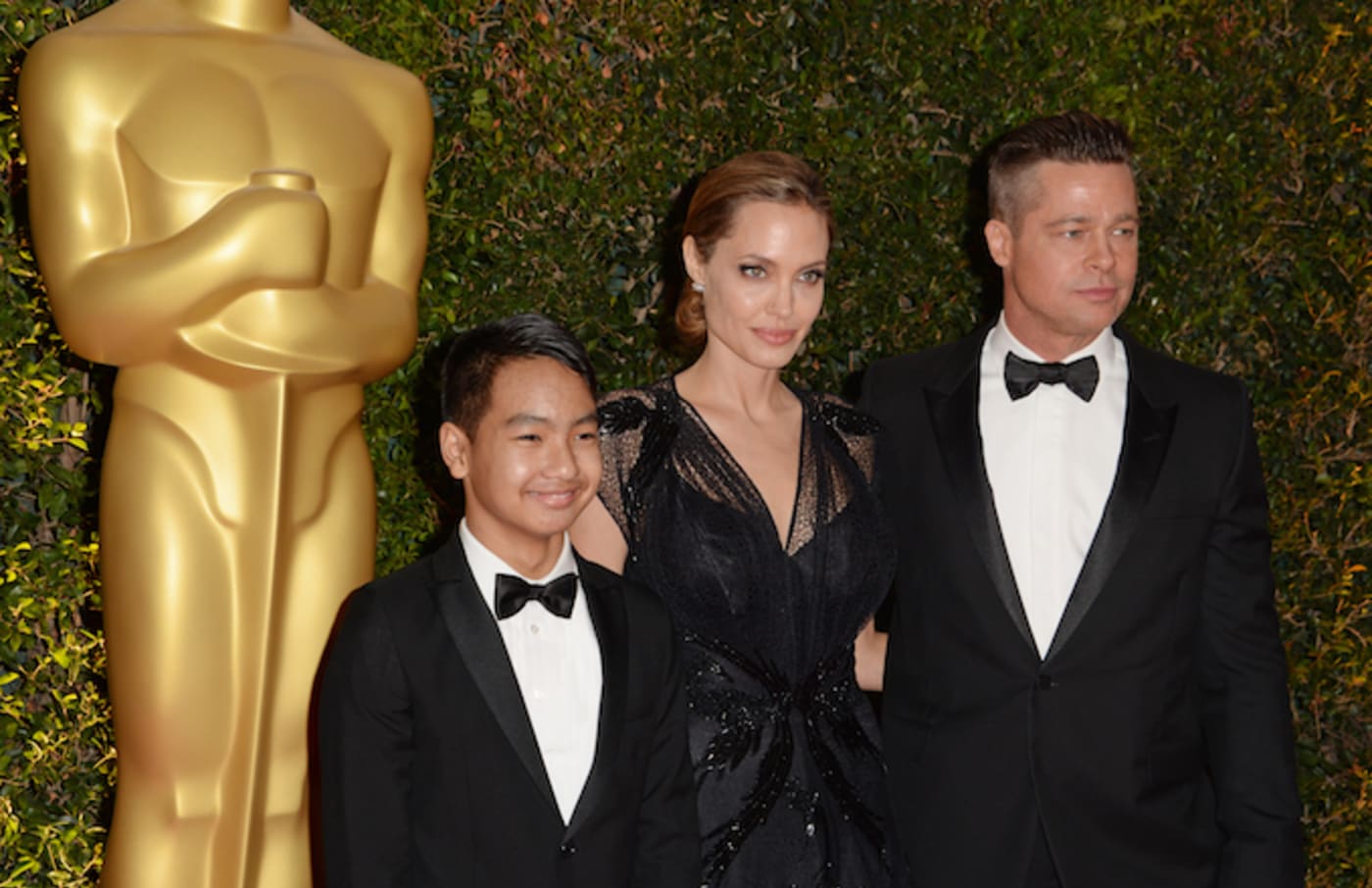 Angelina Jolie and Brad Pitt with their son Maddox at the Oscars in 2013.