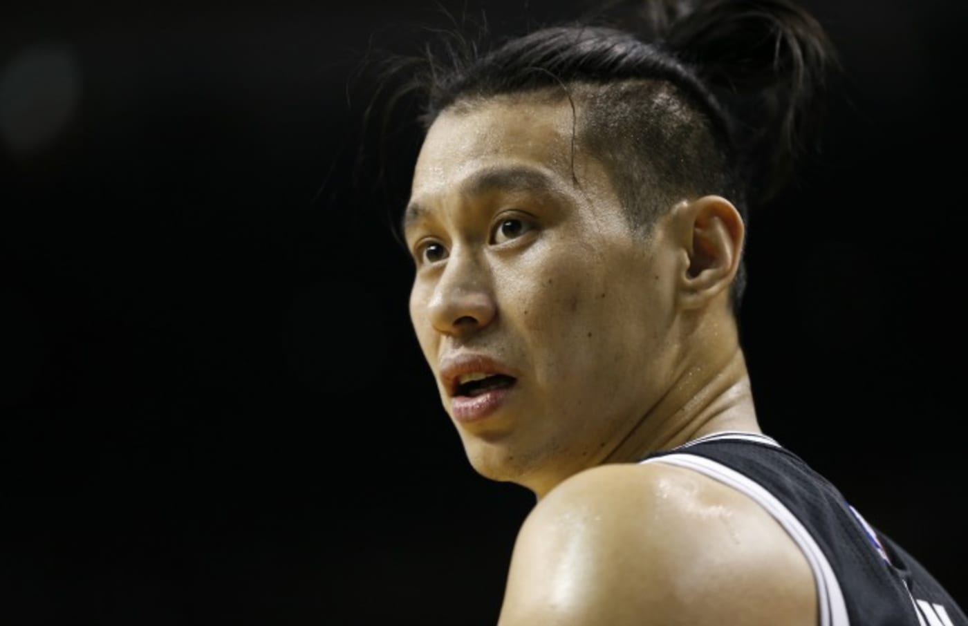 Jeremy Lin reacts to a call during a Nets game.