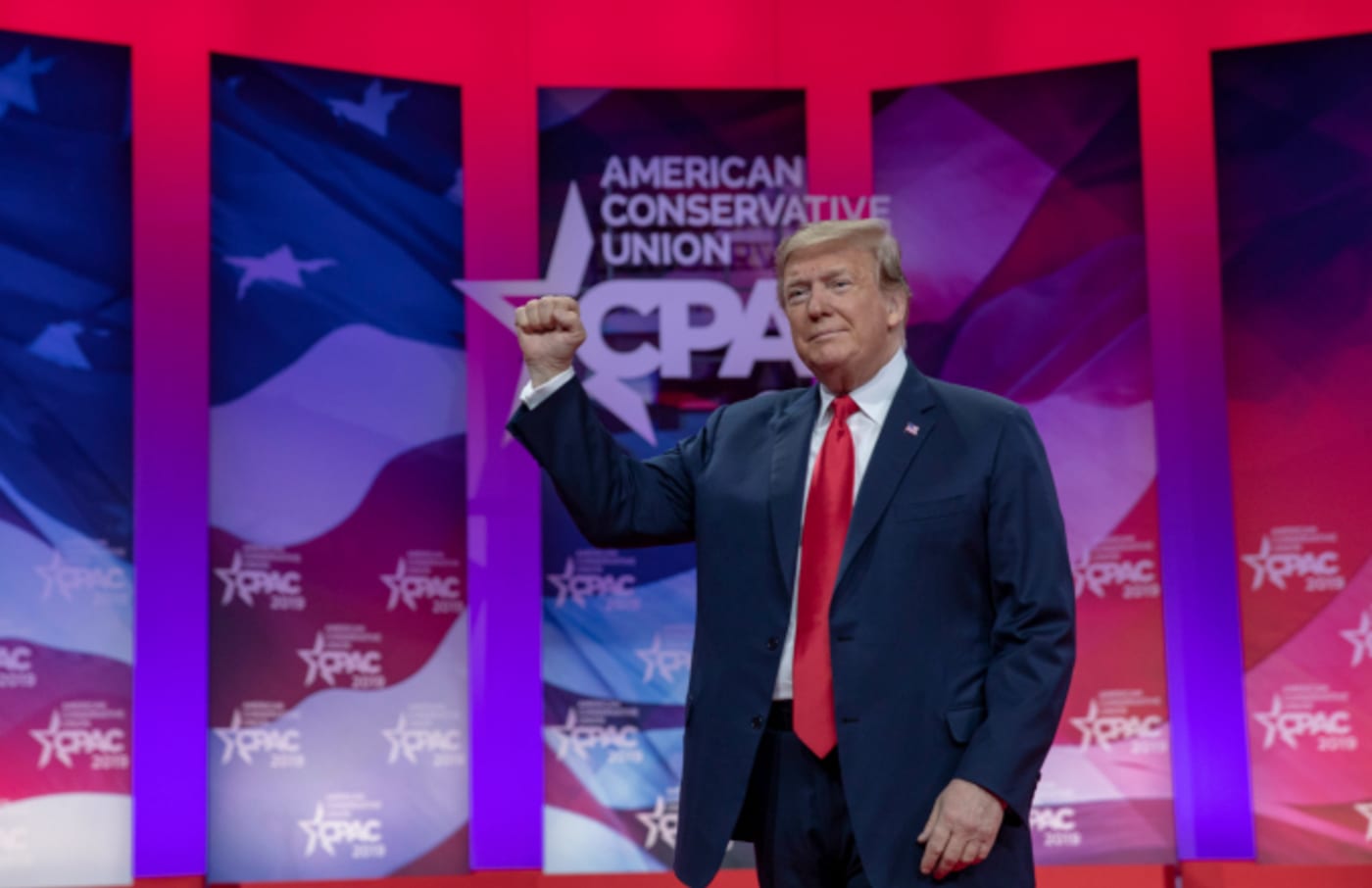President Donald Trump greets supporters during CPAC 2019