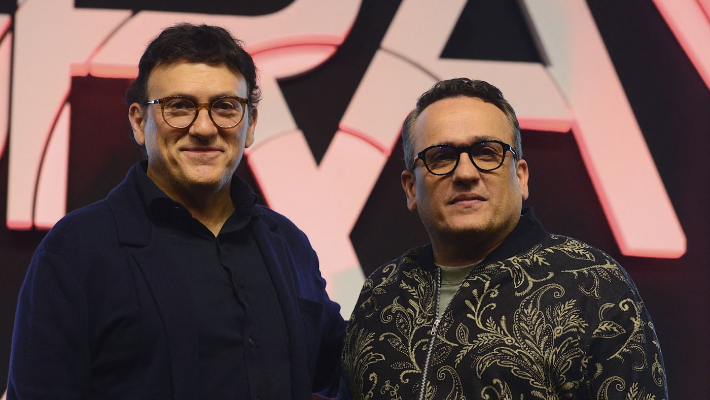 Joseph and Anthony Russo pose for pictures during 'The Gray Man' press conference.