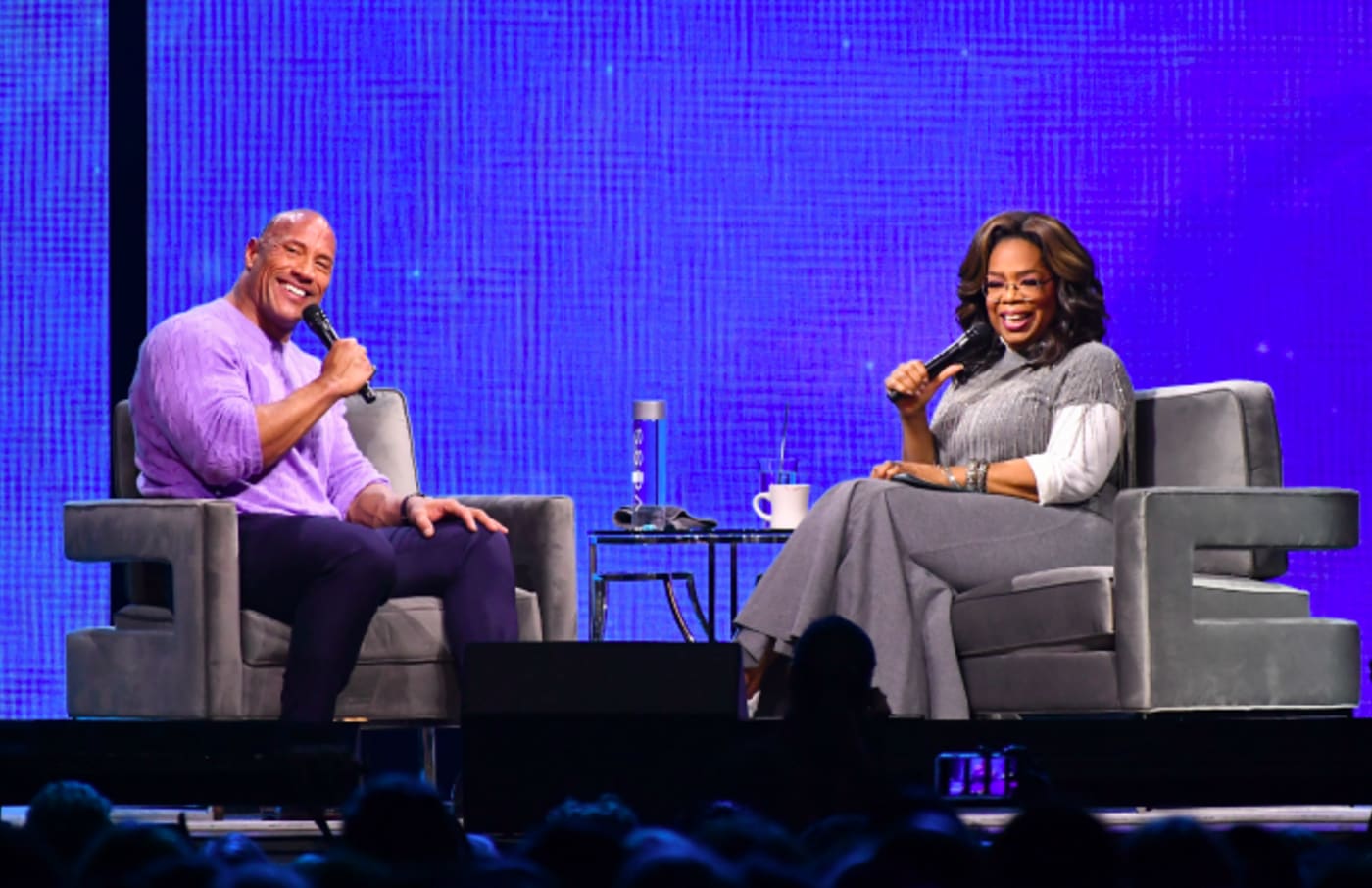 Dwayne Johnson and Oprah Winfrey onstage
