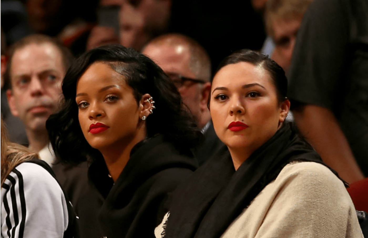 Rihanna and Jennifer Rosales attend NBA game