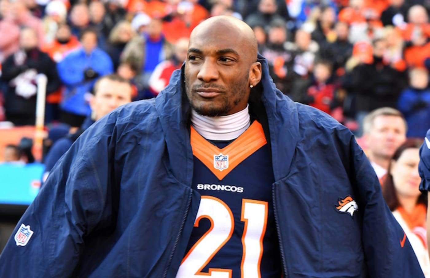 Aqib Talib watches game from the sidelines.