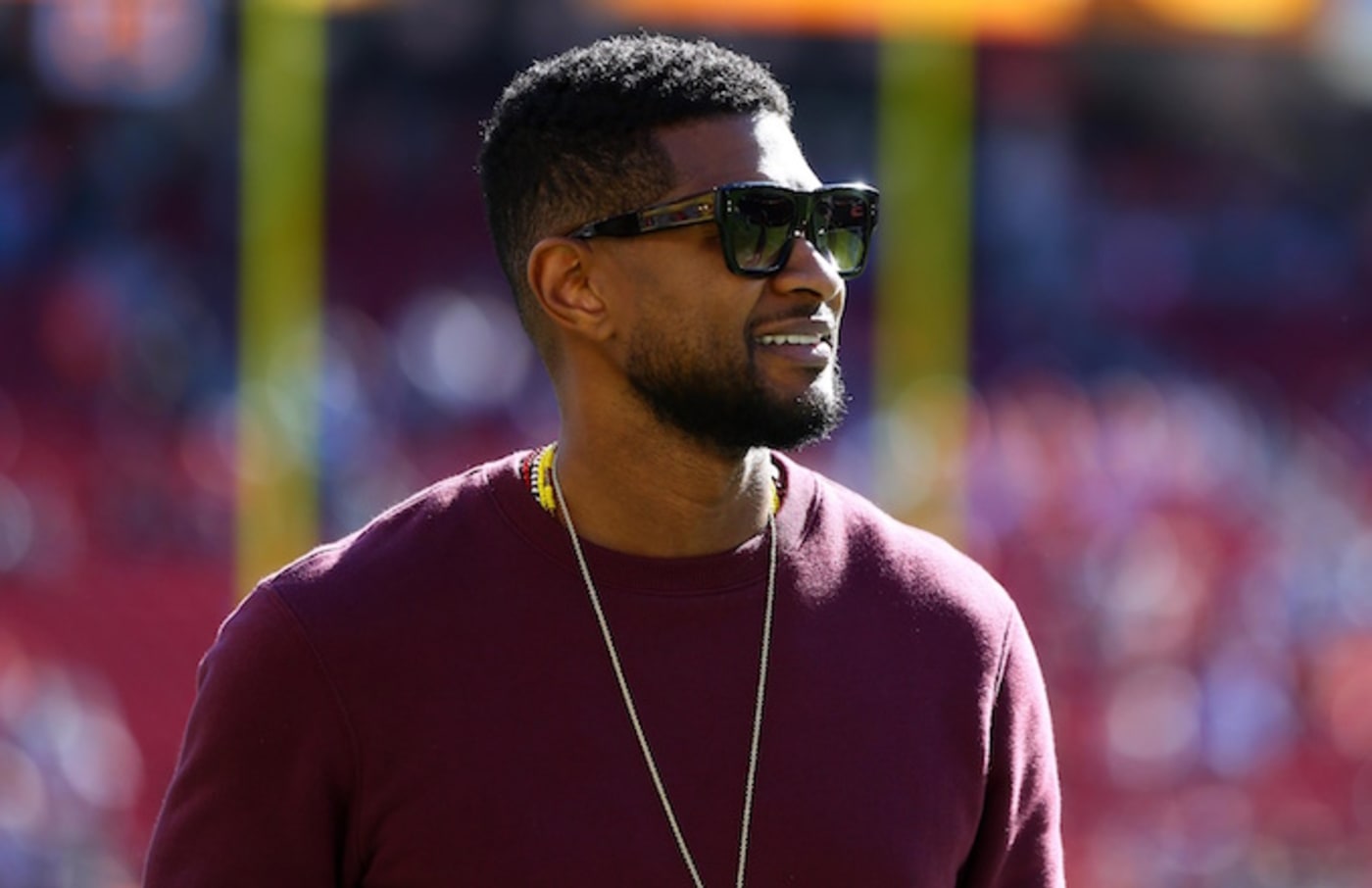 Usher on the field before Super Bowl 50.