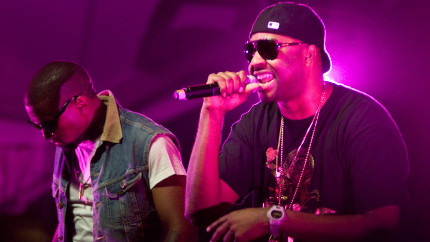 GLC is seen performing with the artist formerly known as Kanye West