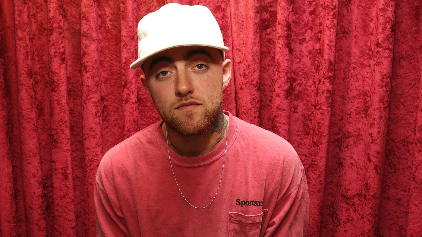 Mac Miller is pictured posing for the camera