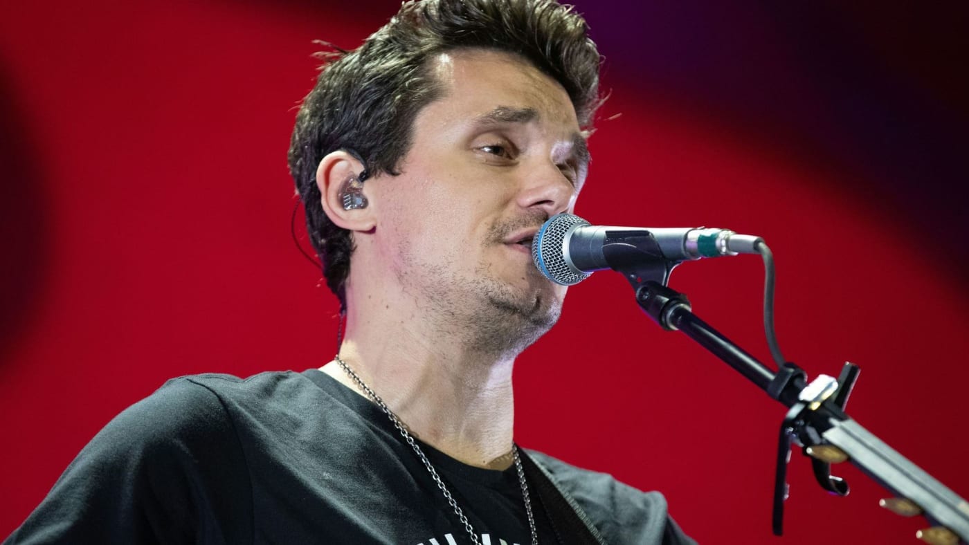 John Mayer performing on tour in 2019