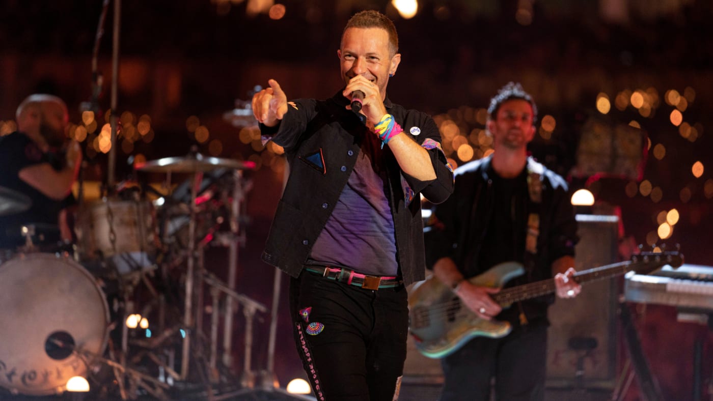 Coldplay frontman Christ Martin is pictured pointing a finger