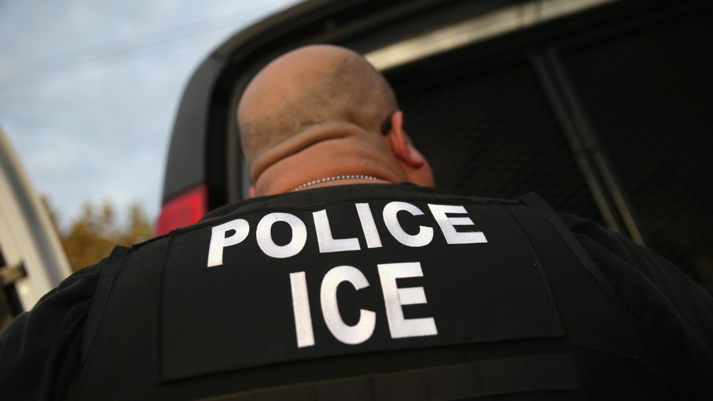 U.S. Immigration and Customs Enforcement (ICE), agents detain an immigrant.