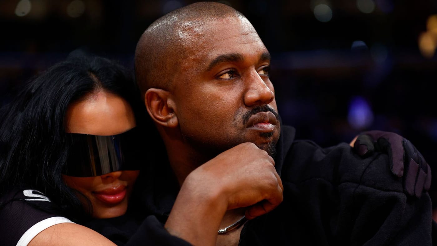 Kanye West and Chaney Jones attend a game between the Washington Wizards and the Los Angeles Lakers
