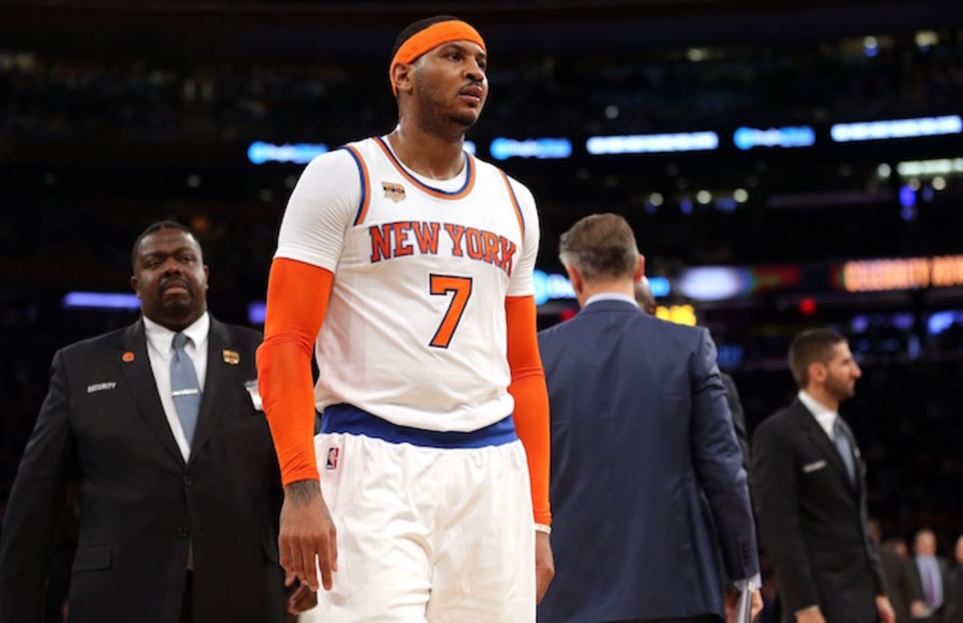 Carmelo Anthony walks off the court in disgust.