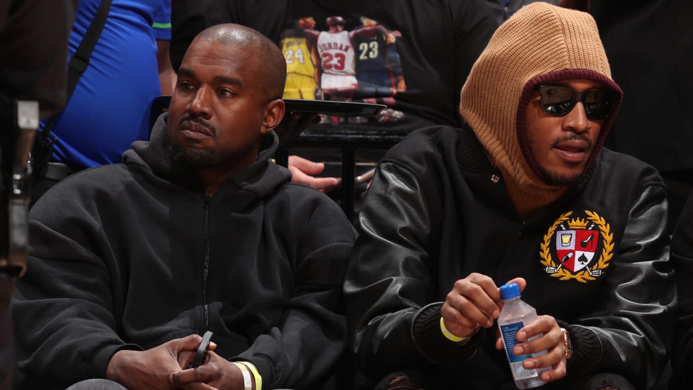Kanye West and Future attend the game between the Minnesota Timberwolves and the Miami Heat