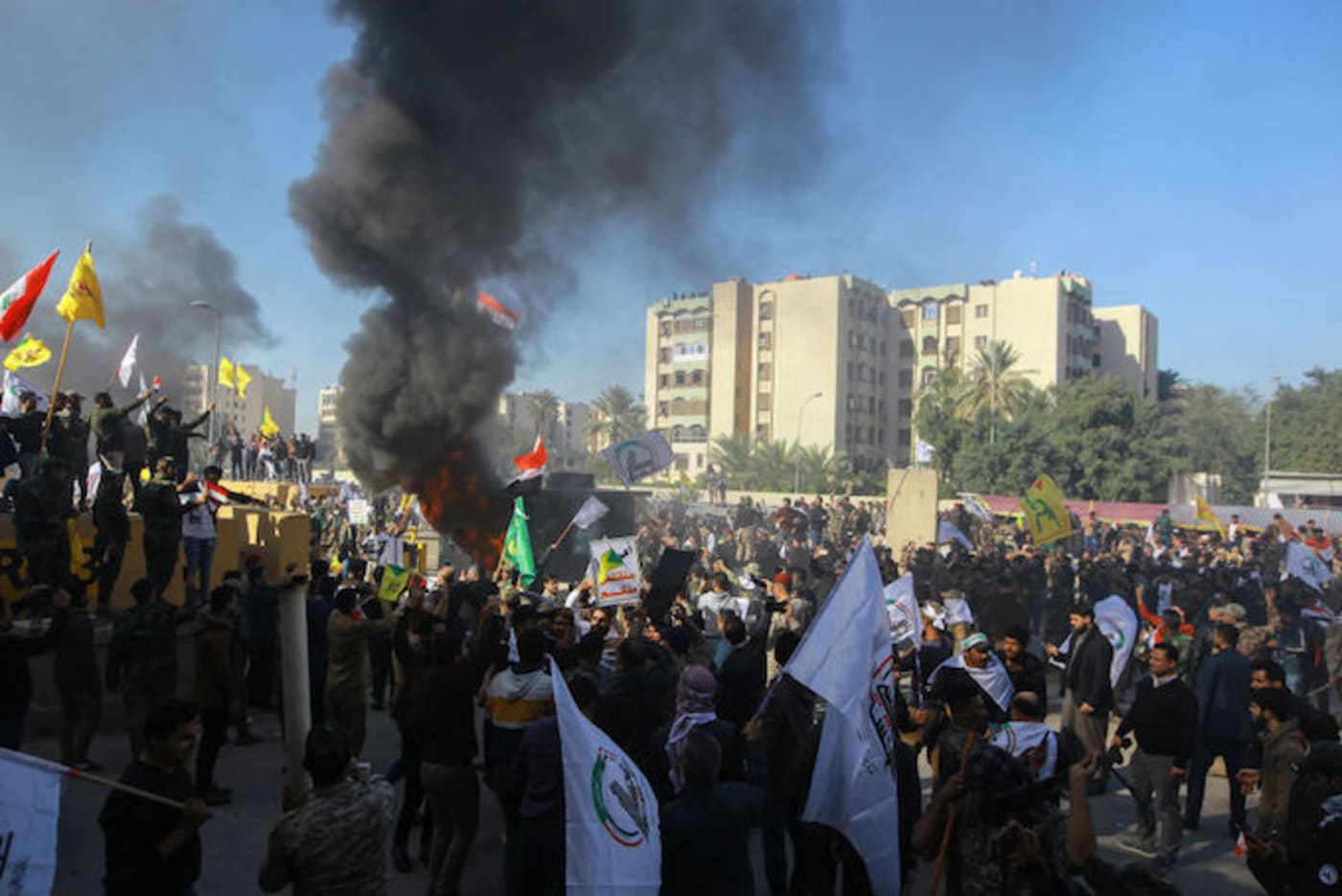 Protesters Gather at Baghdad Embassy After American Airstrikes on Iran