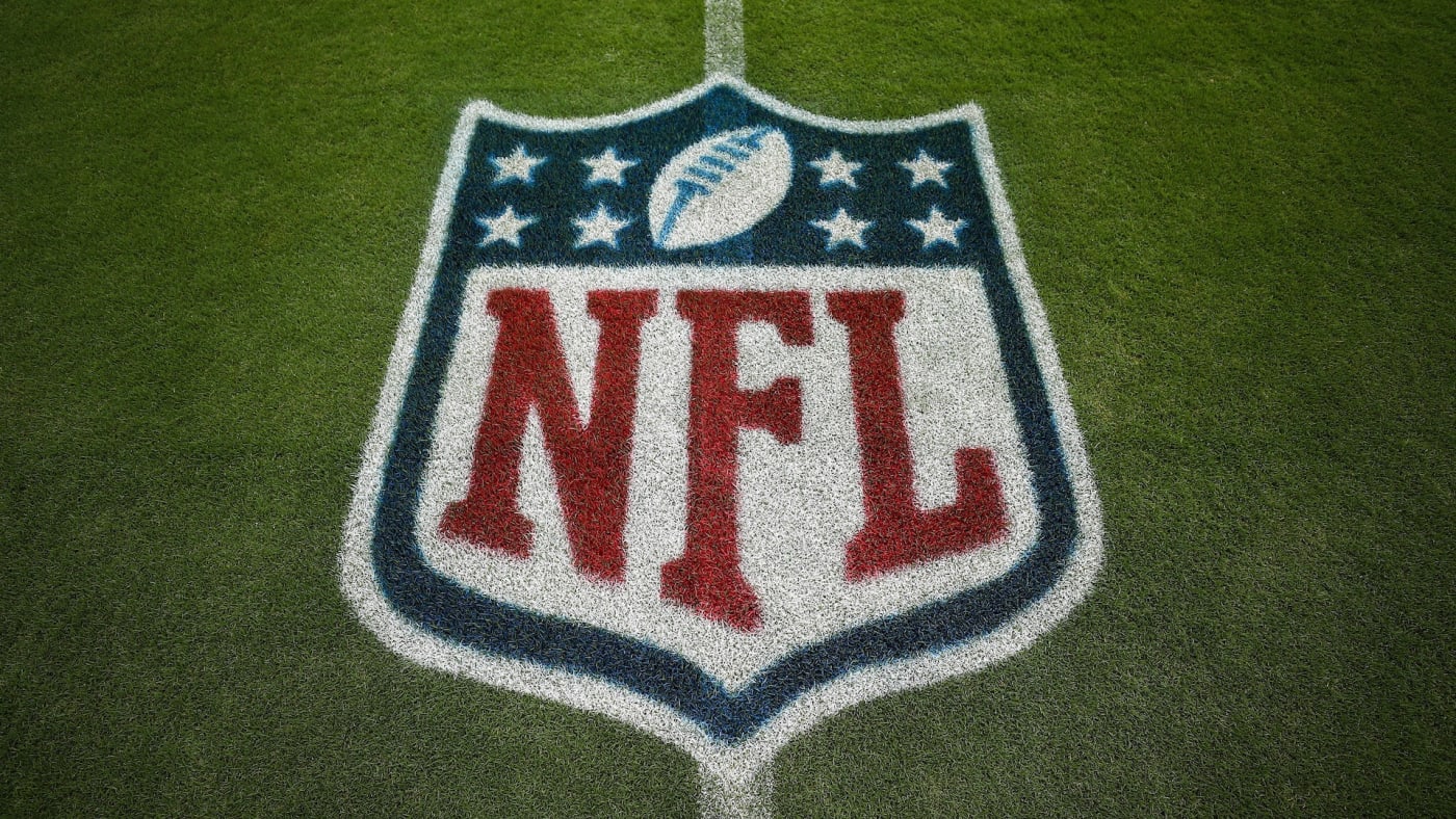 A detail shot of the NFL shield logo painted on the grass