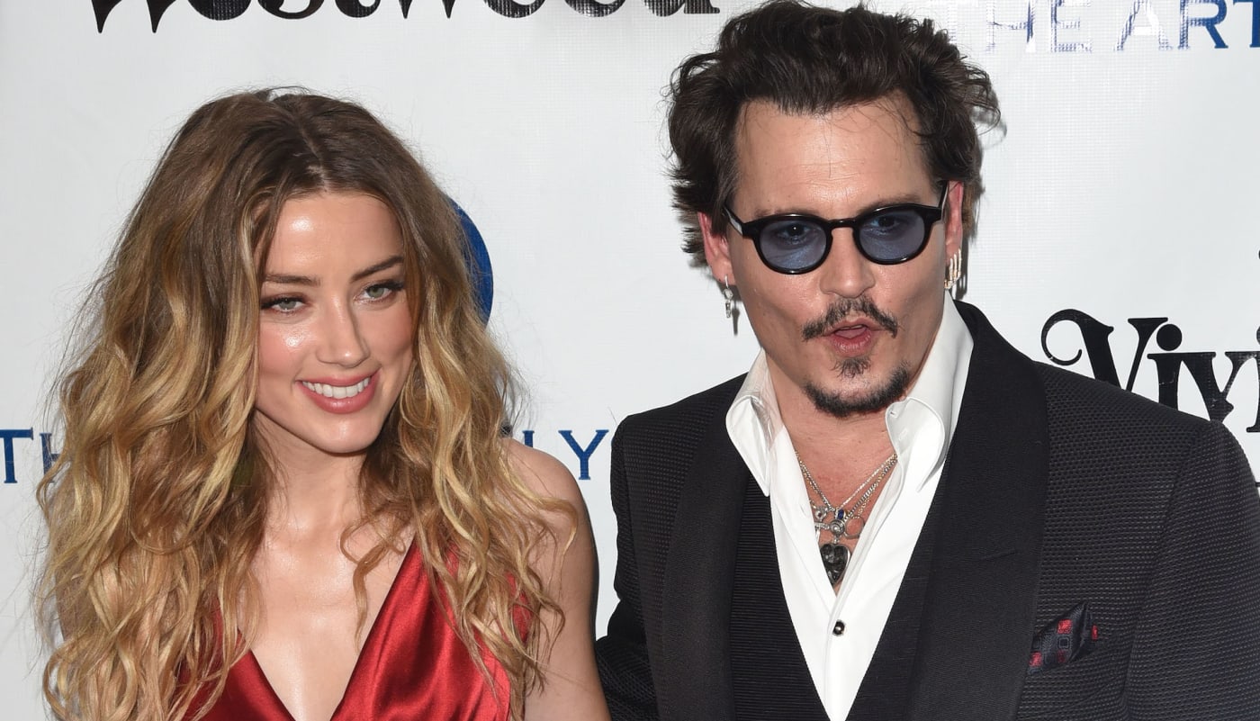 Johnny Depp and Amber Heard on red carpet in 2018