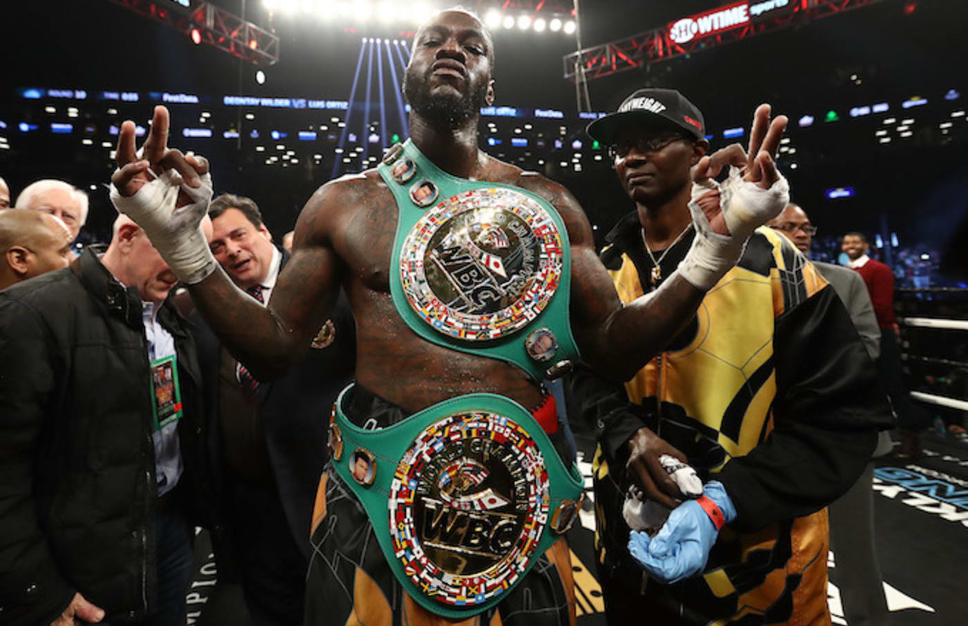 Deontay Wilder poses after knocking out Luis Ortiz.