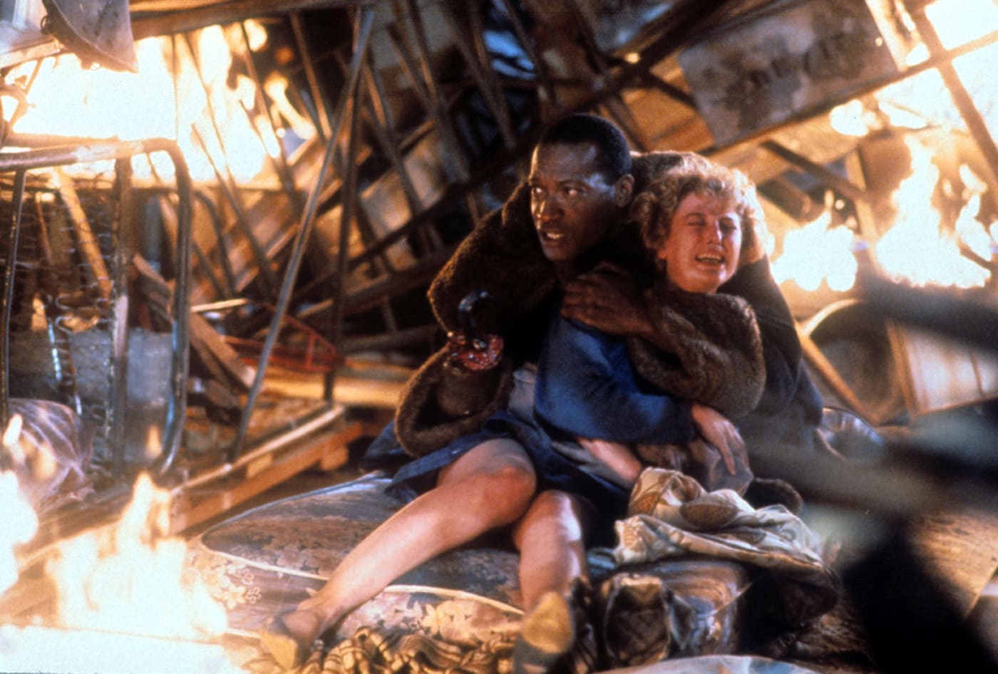 Tony Todd holds onto Virginia Madsen in a scene from the film 'Candyman', 1992.