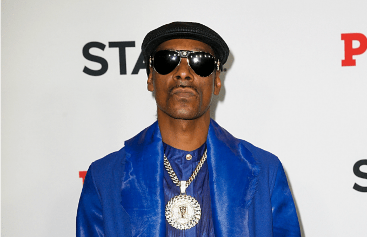 Snoop Dogg Brings Pole Dancers to University of Kansas Performance