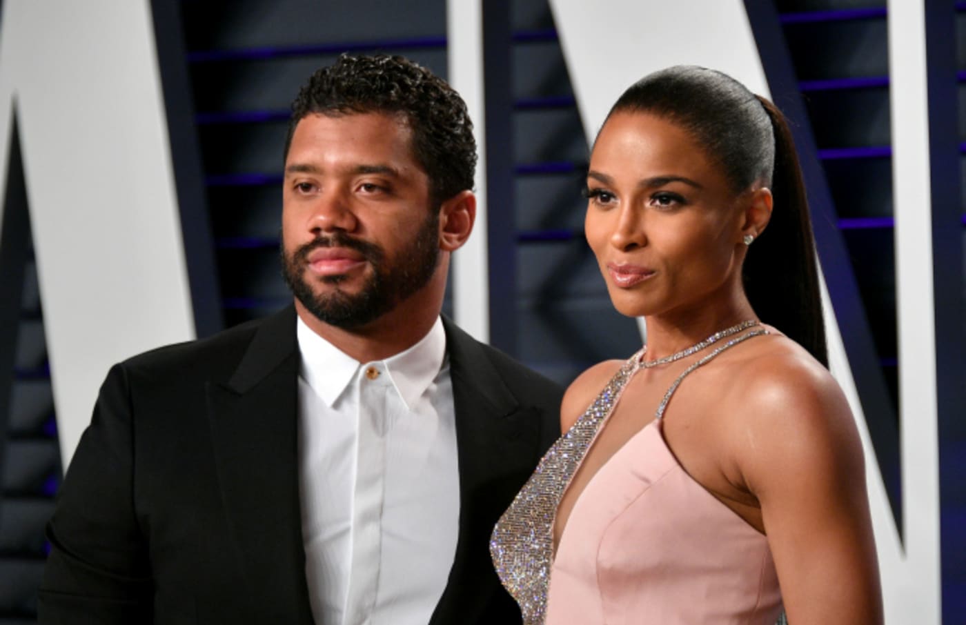 Russell Wilson (L) and Ciara