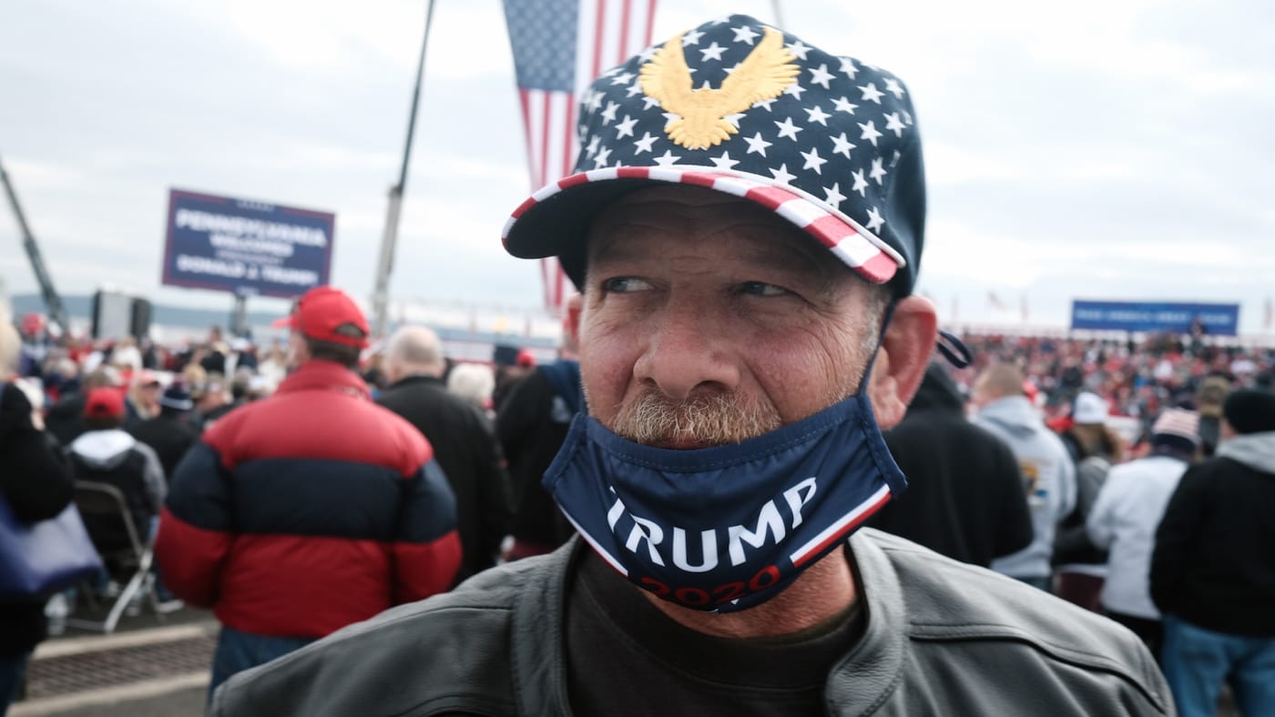 Supporters of President Donald Trump arrive to a rally