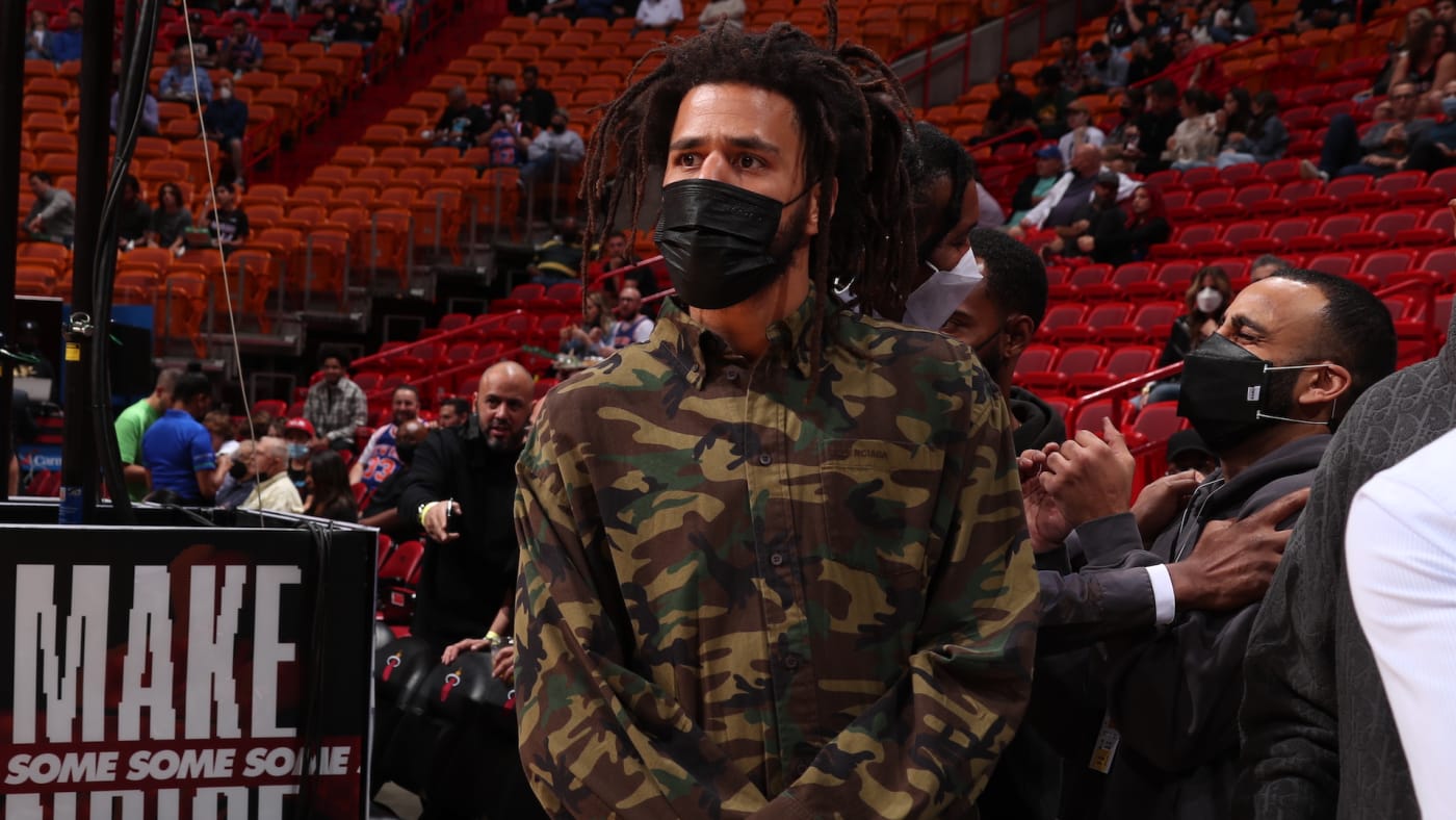 Rapper, J. Cole attends the game between the New York Knicks and the Miami Heat