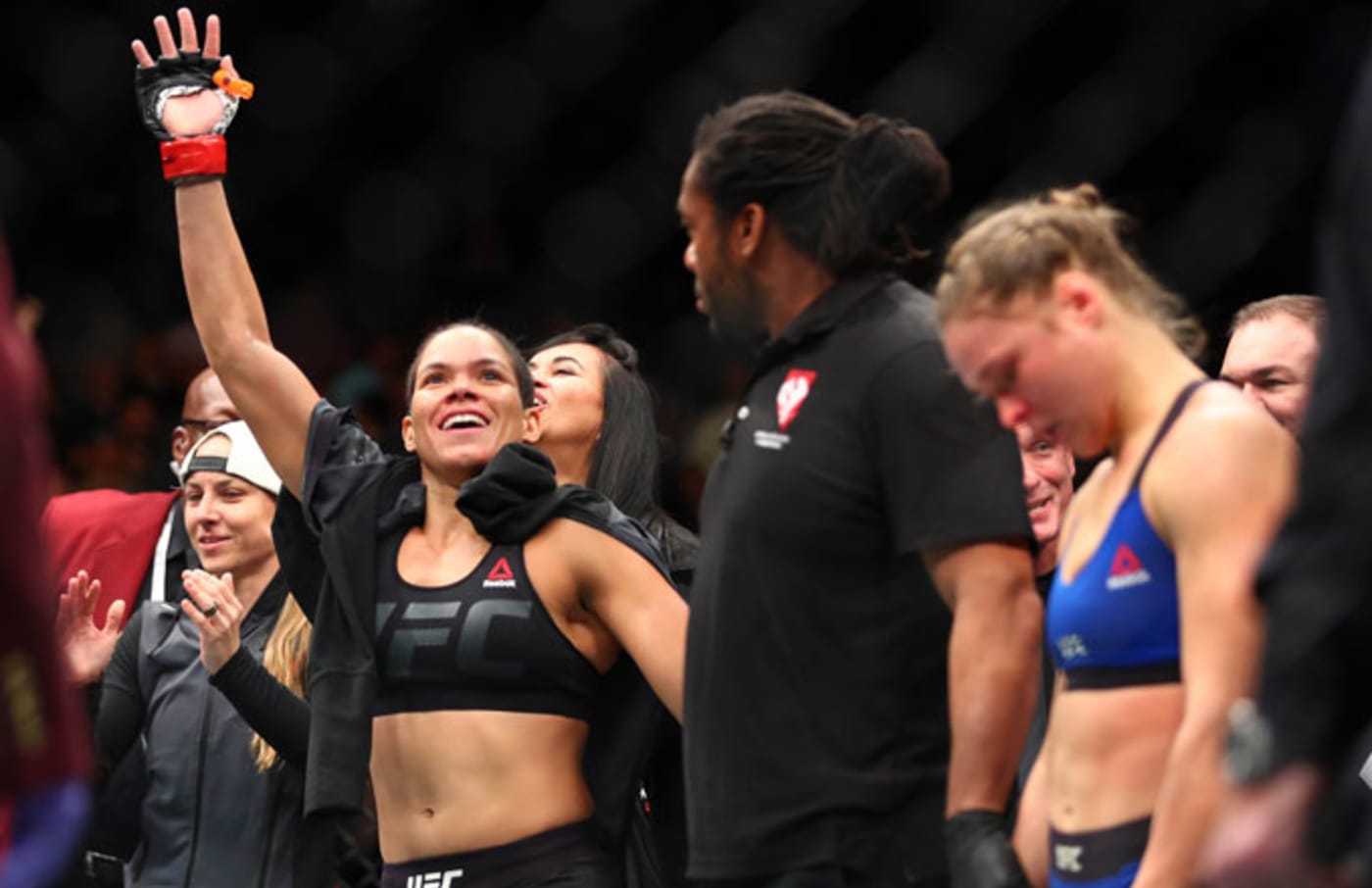 Amanda Nunes celebrates her victory over Ronda Rousey at UFC 207.