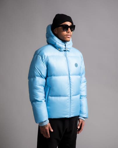 Model in light blue puffer coat -
