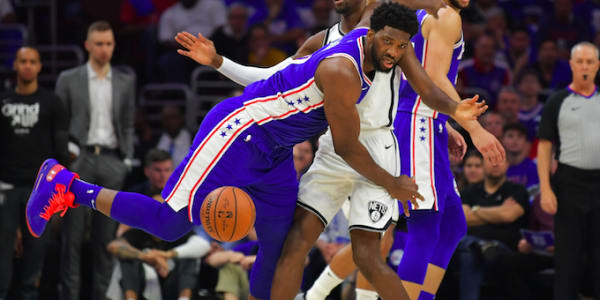 Joel Embiid Caught Looking at Cell Phone During 76ers' Playoff Opener Against the Nets | Complex