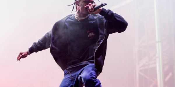 Travis Scott Hit With Lawsuit From Fan Who Fell From Balcony During ...