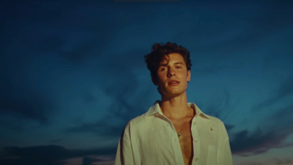 Shawn Mendes Shares Video for New Track “Summer of Love” f/ Tainy Complex