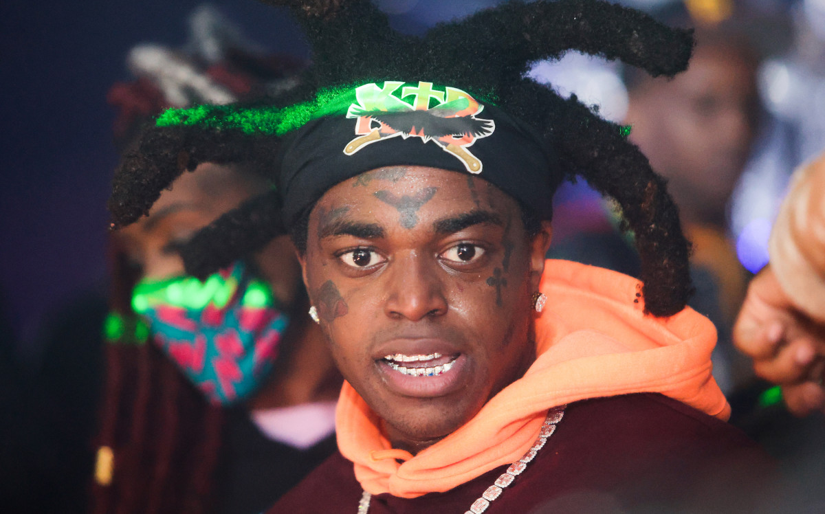 People React to Kodak Black Throwing Stacks of $100 Bills Off Boat