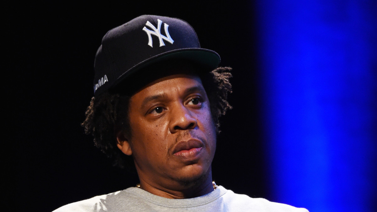 Cam Ron Defends Jay Z S Drug Dealing Past After Faizon Love Calls Him Out Complex