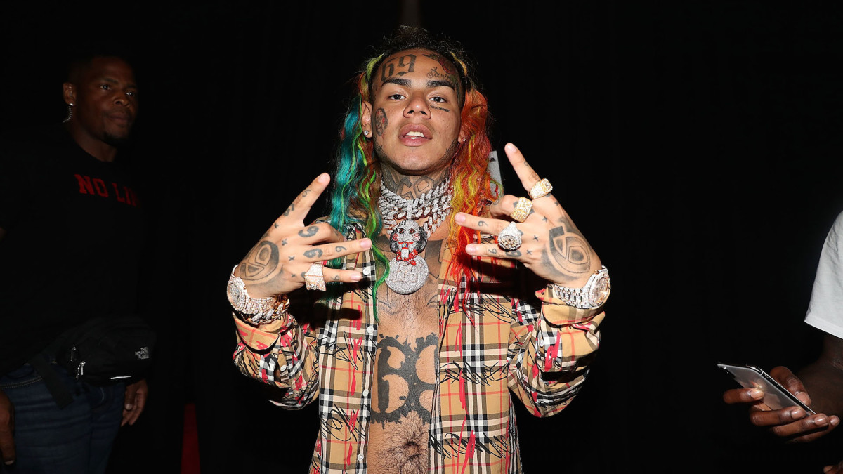 Video Appears To Show Man Confronting Tekashi 6ix9ine Getting Punched Complex