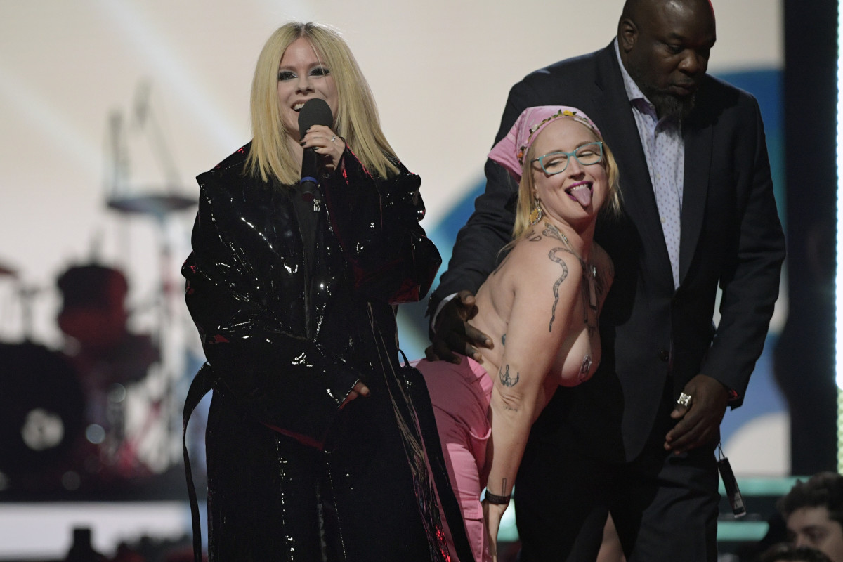 Topless Protestor Interrupts Avril Lavigne at the Juno Awards