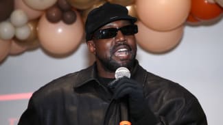Kanye West attends the Los Angeles Mission's Annual Thanksgiving event at the Los Angeles Mission