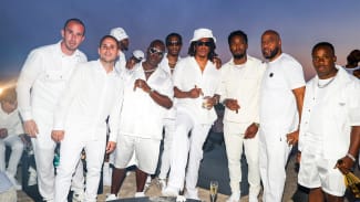 Jay Z and others attend Michael Rubin's 4th of July party.