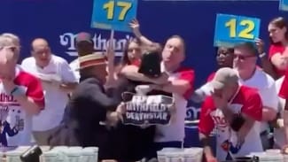 Joey Chestnut choking this guy OUT