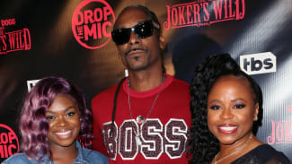 Cori Broadus, Snoop Dogg, and mother Shante attend premiere event.