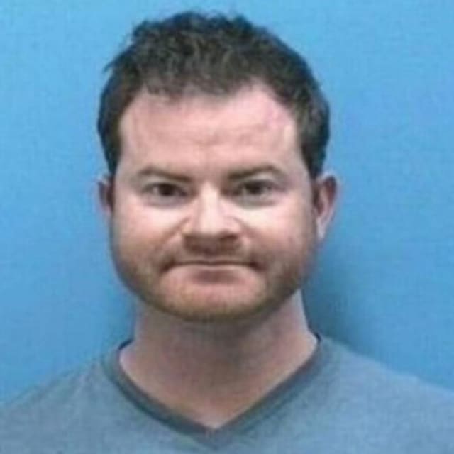 North Carolina Priest Arrested for Allegedly Brandishing Gun in Road