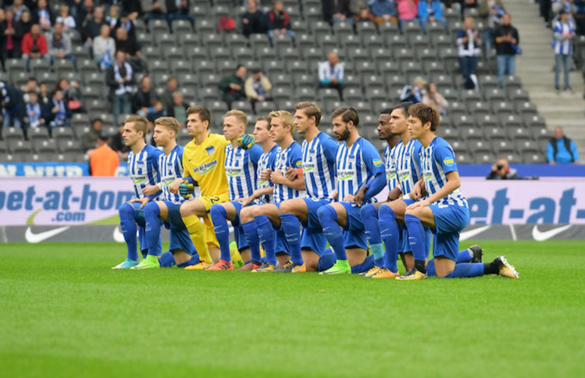 German Soccer Club Hertha BSC Takes a Knee Before Match in ...