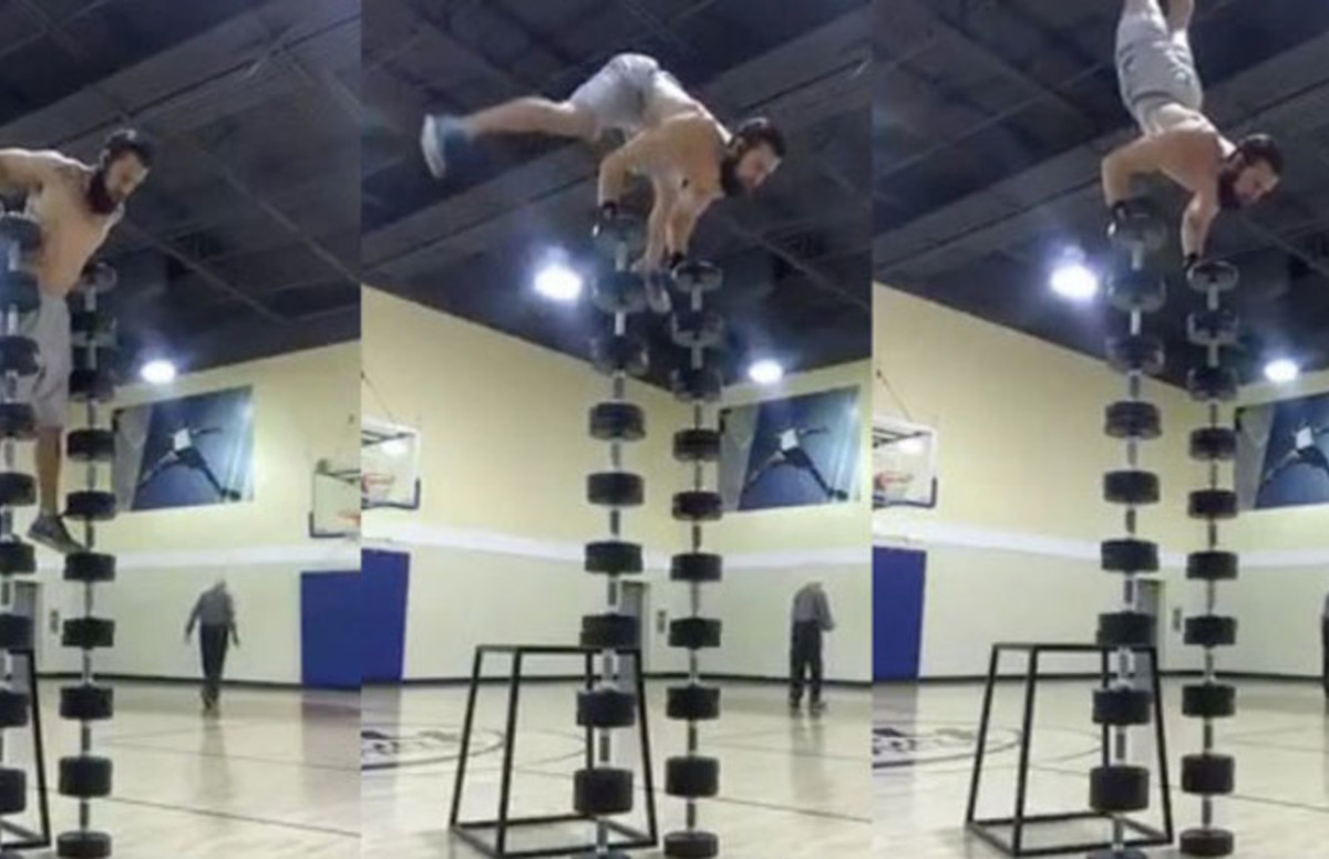 Guy Doing Handstand PushUps on Stack of Dumbbells and Other Super